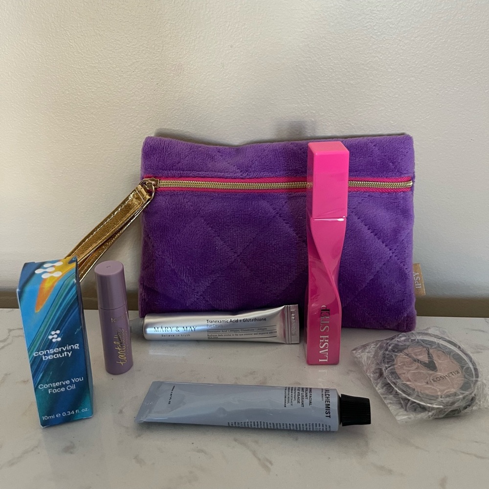 Luxurious Purple Quilted Wristlet with Skincare Products